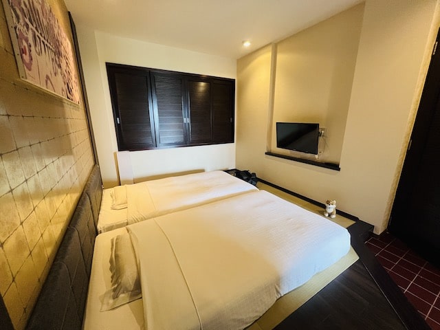 沖縄かりゆしリゾートエグゼス石垣のデラックスルーム琉球モダンタイプのベッドルーム2